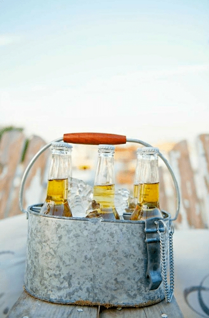 Cold beer goes well with a bbq or buffet meal. Image provided by French Buckets Florist - WeddingCompass.com